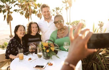 Celebrity Chef Curtis Stone delighted “Dreaming On in California” experience recipients enjoying their celebratory do-overs at a beachside dinner. To mark the state’s official reopening for travel, MMGY NJF worked with client Visit California to design a series of once-in-a-lifetime experiences and launch the campaign which called upon locals and visitors to apply and share their stories of postponed dreams, skipped plans and canceled celebrations from 20w20 for the opportunity to make those missed moments come true this year – California style. Photo credit: Max Whittaker